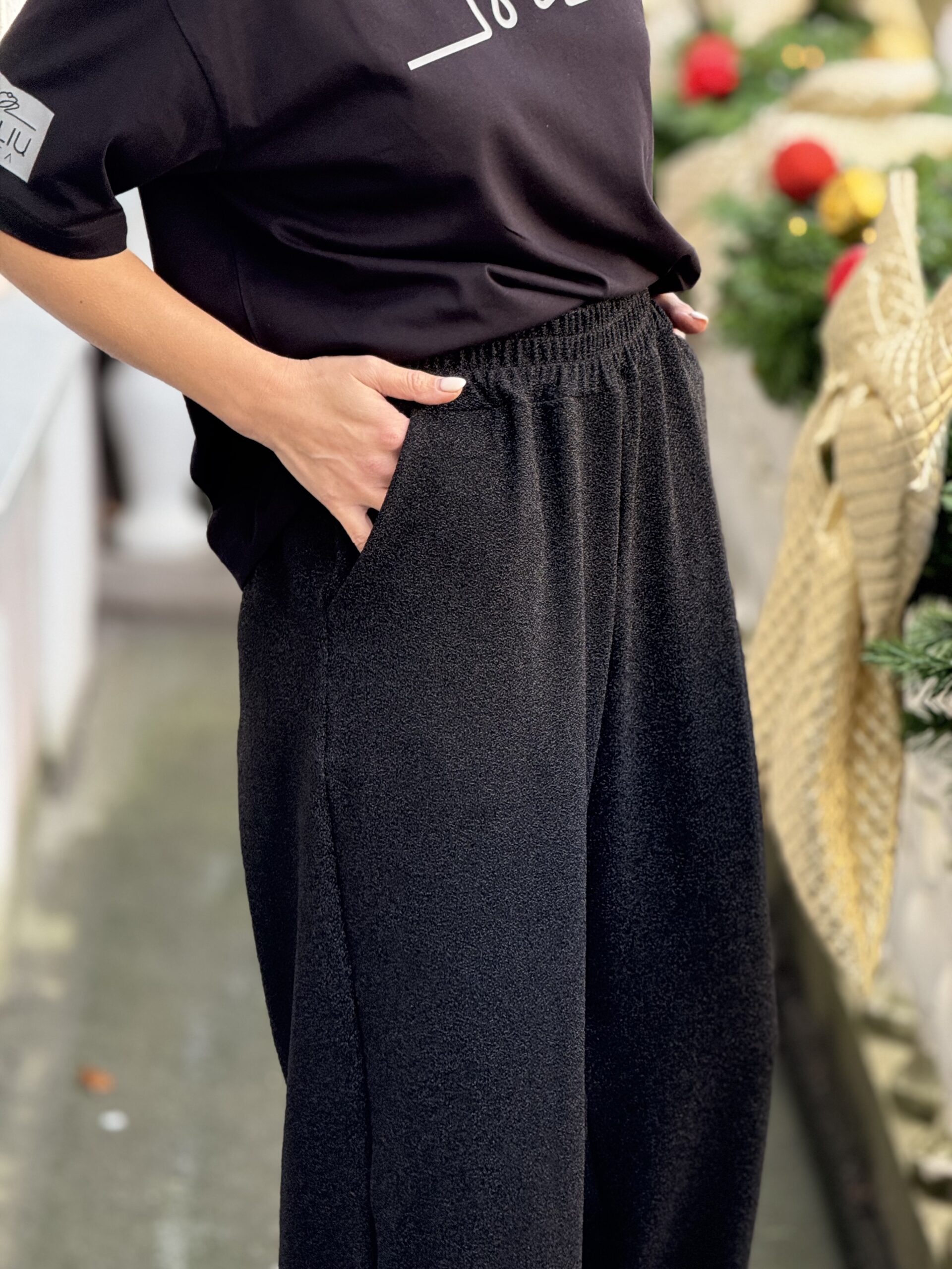 BLIZGIOS juodos kelnės